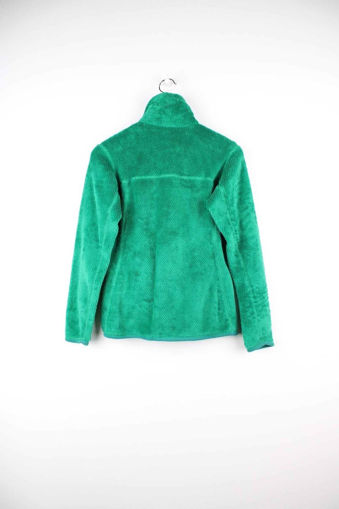 Patagonia Snap-T pullover Polartec fleece in green. Features chest pocket and embroidered logo.