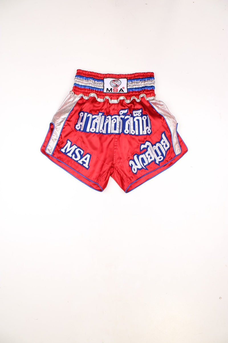 Red, blue and silver MSA Thai Boxing shorts, with badge on the waistband and embroidered lettering. 