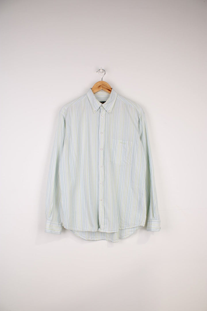 Fila Sport Classic Long Sleeved Shirt in a blue, white and green striped colourway, button up and has a chest pocket with the logo embroidered on it.