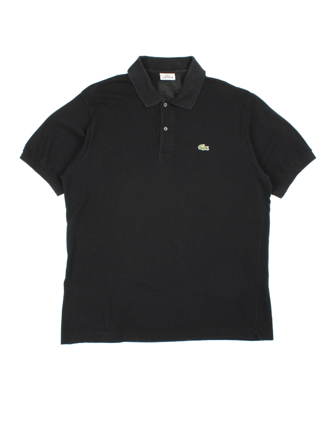 Vintage Lacoste Polo Shirt in a black colourway and has the logo embroidered on the front.