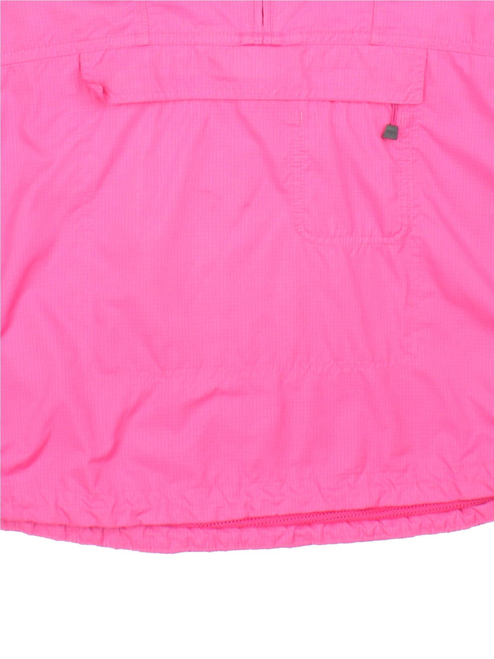 Vintage Nike ACG Windbreaker in a pink colourway, 1/4 zip fastening with hood and packs into mesh storage bag.