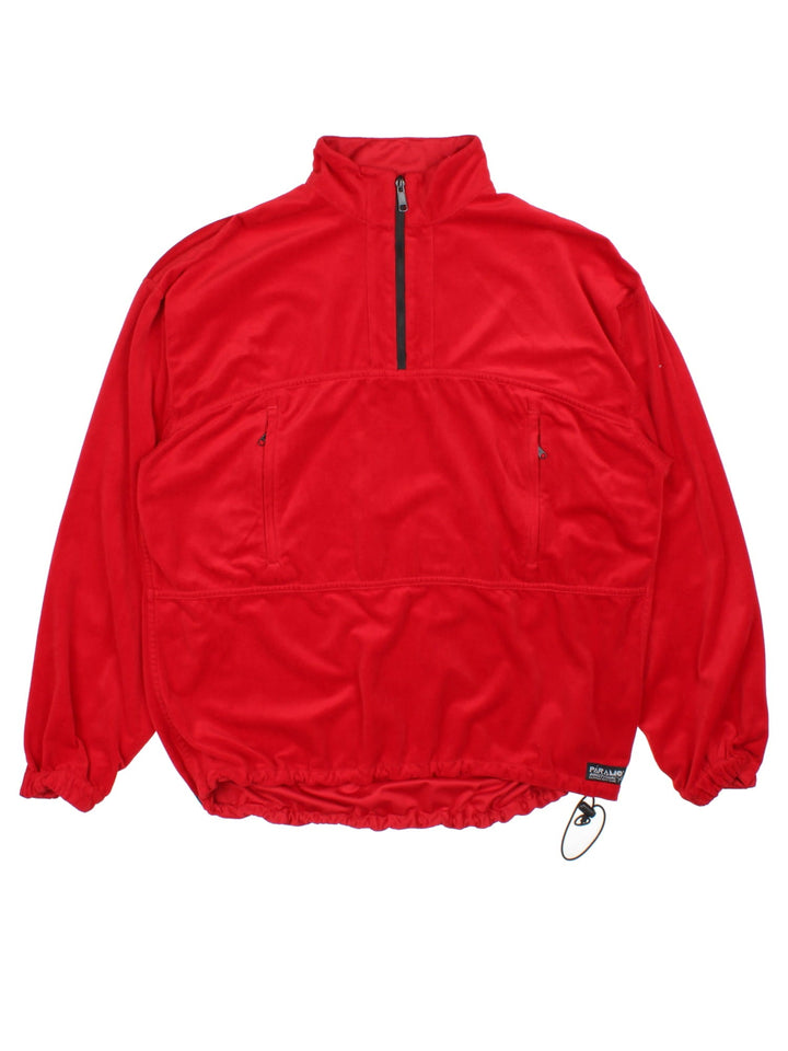 Vintage Paramo Parameta Reversible Fleece in a red colourway, 1/4 zip fastening embroideded patch branding on front and back.