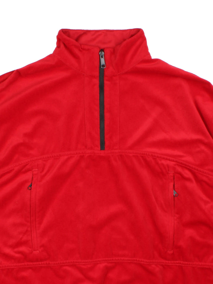 Vintage Paramo Parameta Reversible Fleece in a red colourway, 1/4 zip fastening embroideded patch branding on front and back.