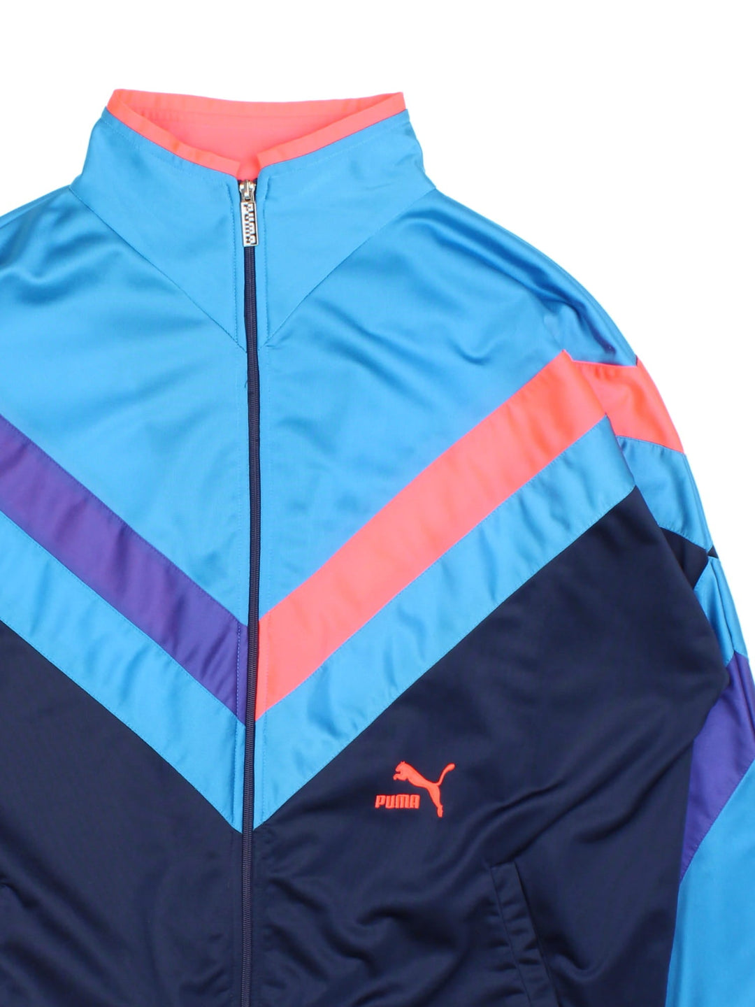 Vintage 80's Puma tracksuit top in a blue colourway, zip fastening and embroideded logo on front and back.