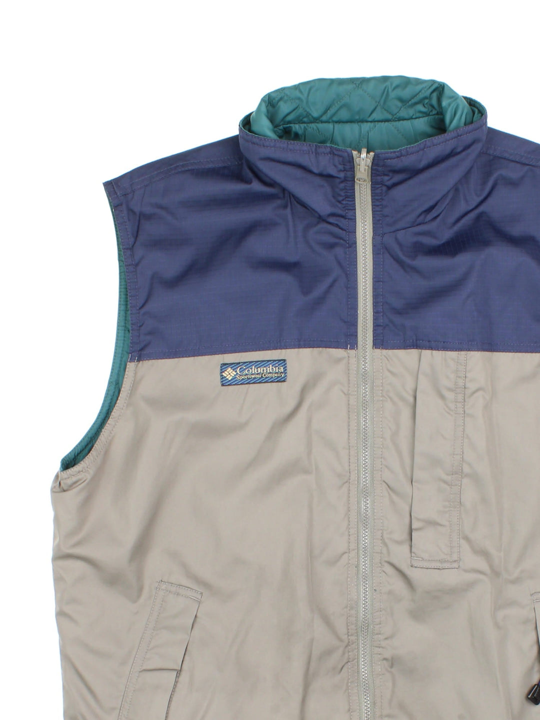 Vintage Reversible Columbia Gilet in either a blue and beige, or green colourway options, multiple pockets with quilted reverse and patch branding on front.