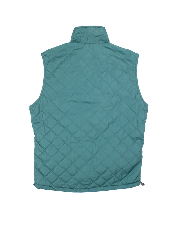 Vintage Reversible Columbia Gilet in either a blue and beige, or green colourway options, multiple pockets with quilted reverse and patch branding on front.