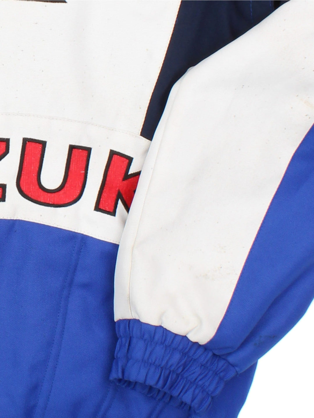 Vintage Suzuki Nascar Jacket in blue colourway, zip popper fastening and embroidered branding on front and back.