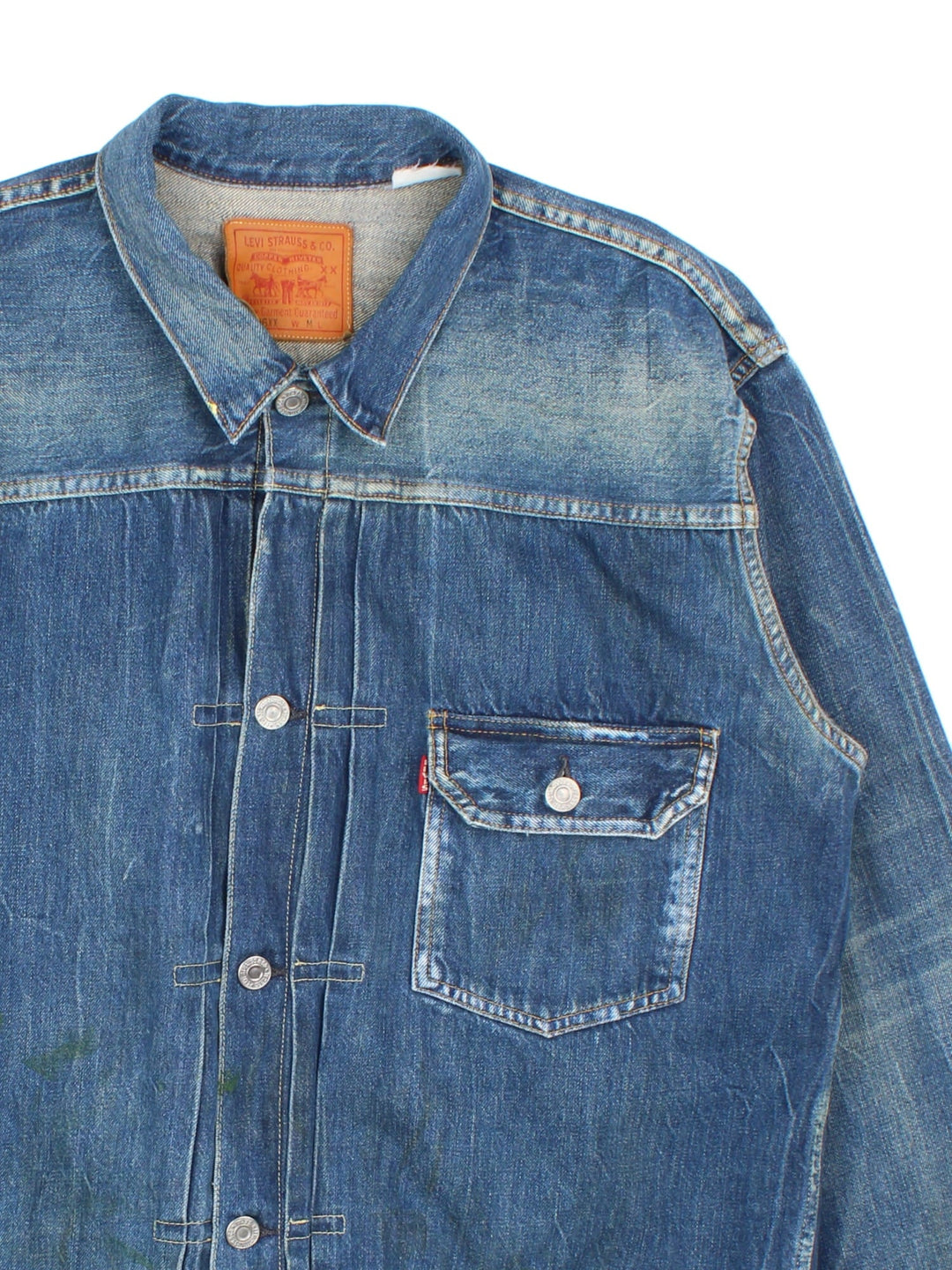 Vintage Levi Strauss Type 1 Denim Jacket in a blue colourway, button up fastening and classic red tab branding on front chest pocket, and has a back buckle.