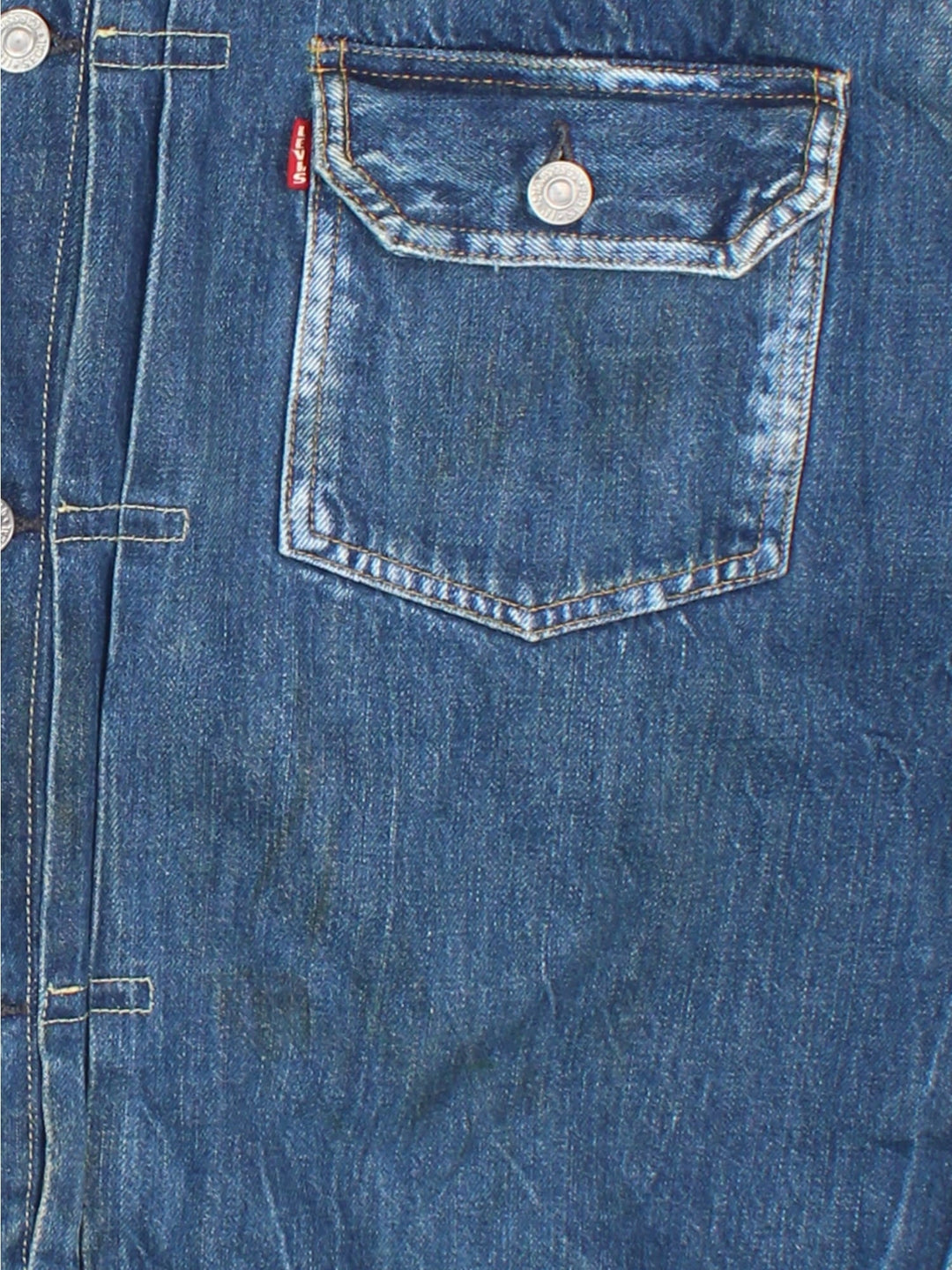 Vintage Levi Strauss Type 1 Denim Jacket in a blue colourway, button up fastening and classic red tab branding on front chest pocket, and has a back buckle.