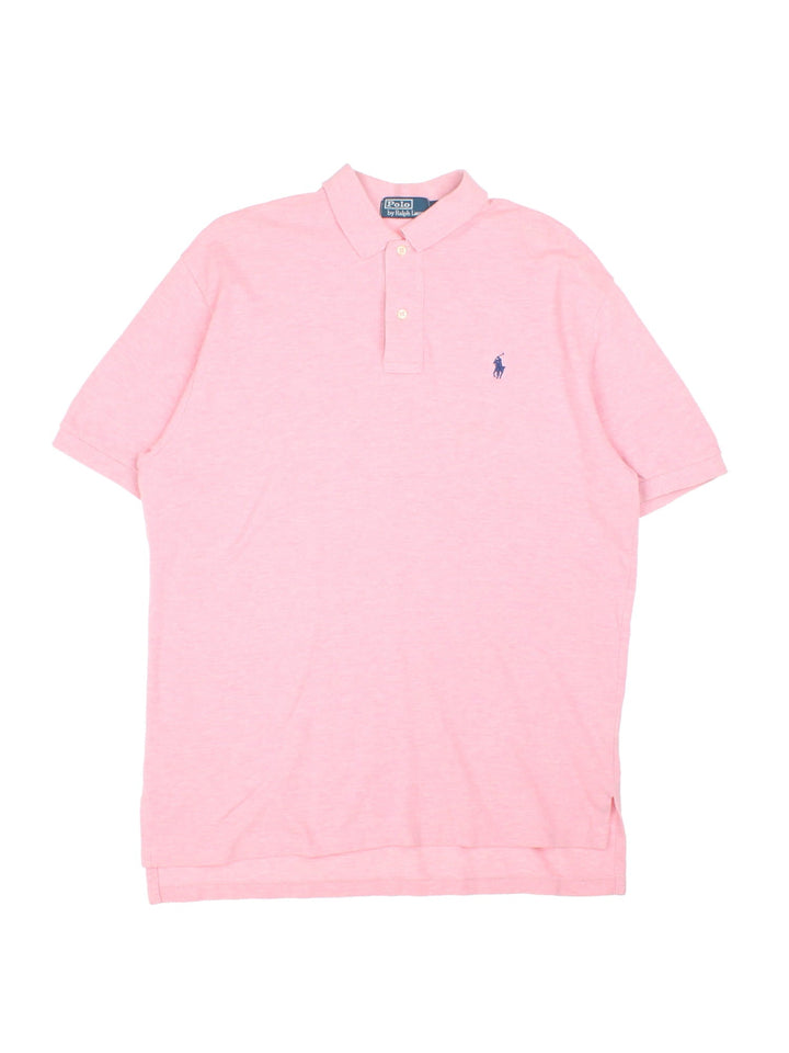 Vintage Ralph Lauren Polo Shirt in a pink colourway with the logo embroidered on the front.