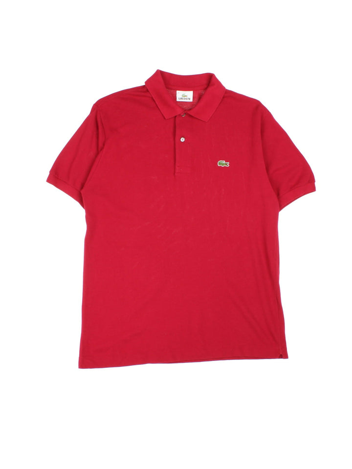 Vintage Lacoste Polo Shirt in a red colourway with the logo embroidered on the front.