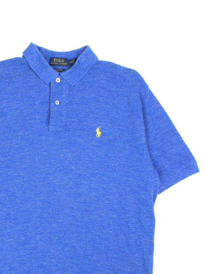 Ralph Lauren Polo Shirt in a blue colourway with the logo embroidered on the front.