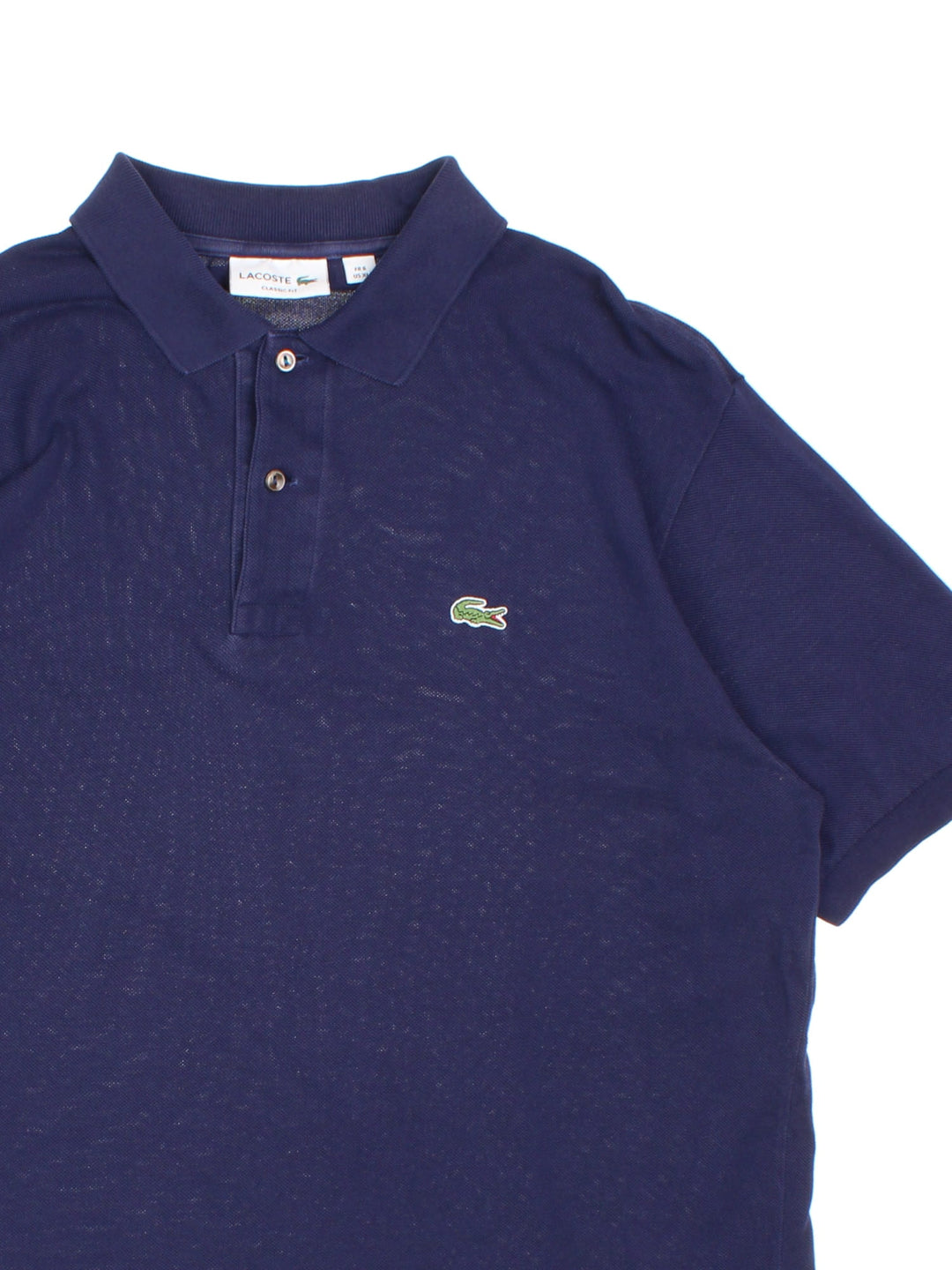 Lacoste Polo Shirt in a blue colourway with the logo embroidered on the front.