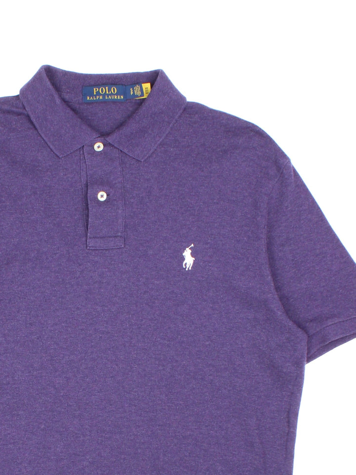 Ralph Lauren Polo Shirt in a purple colourway with the logo embroidered on the front.