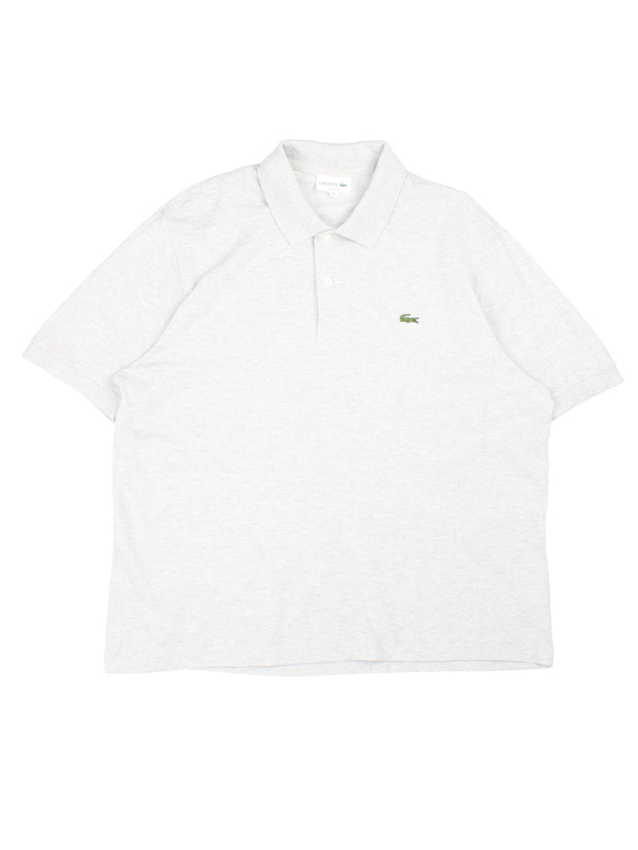 Lacoste Polo Shirt in a grey colourway with the logo embroidered on the front.