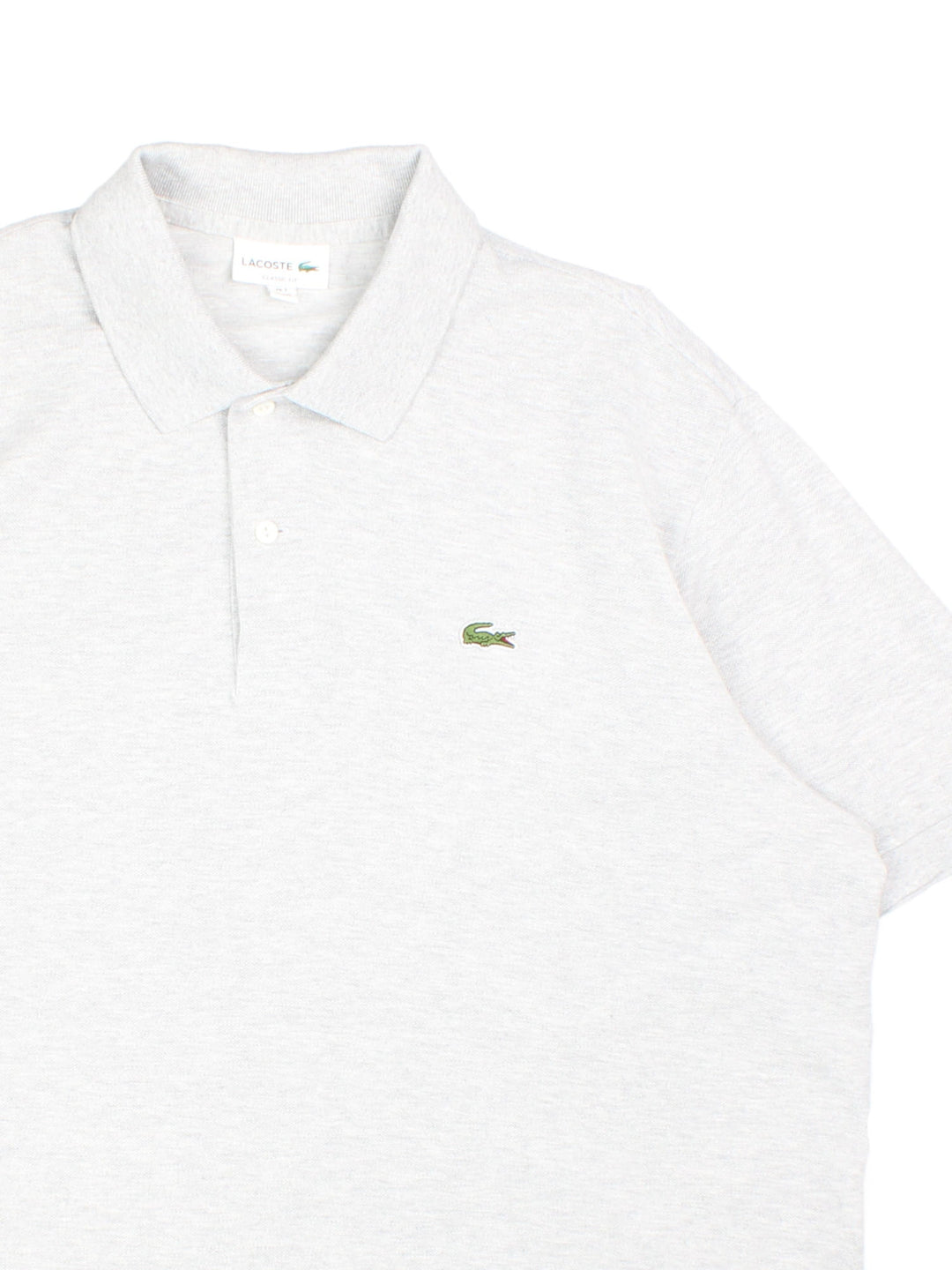 Lacoste Polo Shirt in a grey colourway with the logo embroidered on the front.