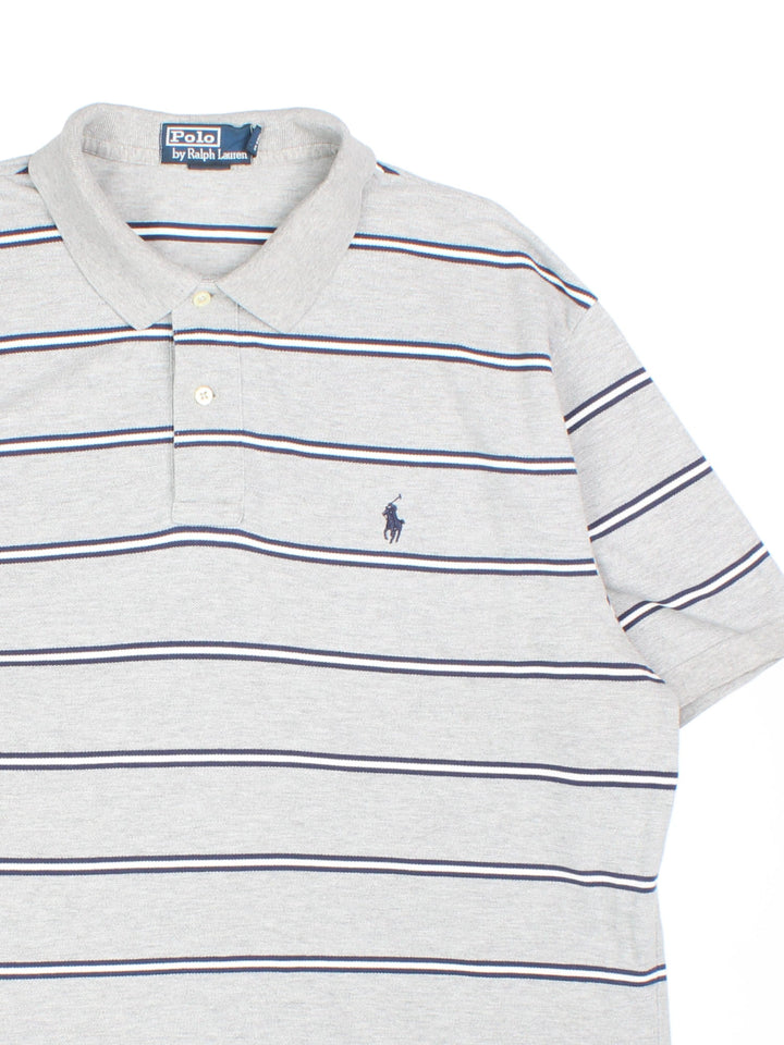 Ralph Lauren Polo Shirt in a grey, navy blue and white striped colourway with the logo embroidered on the front.