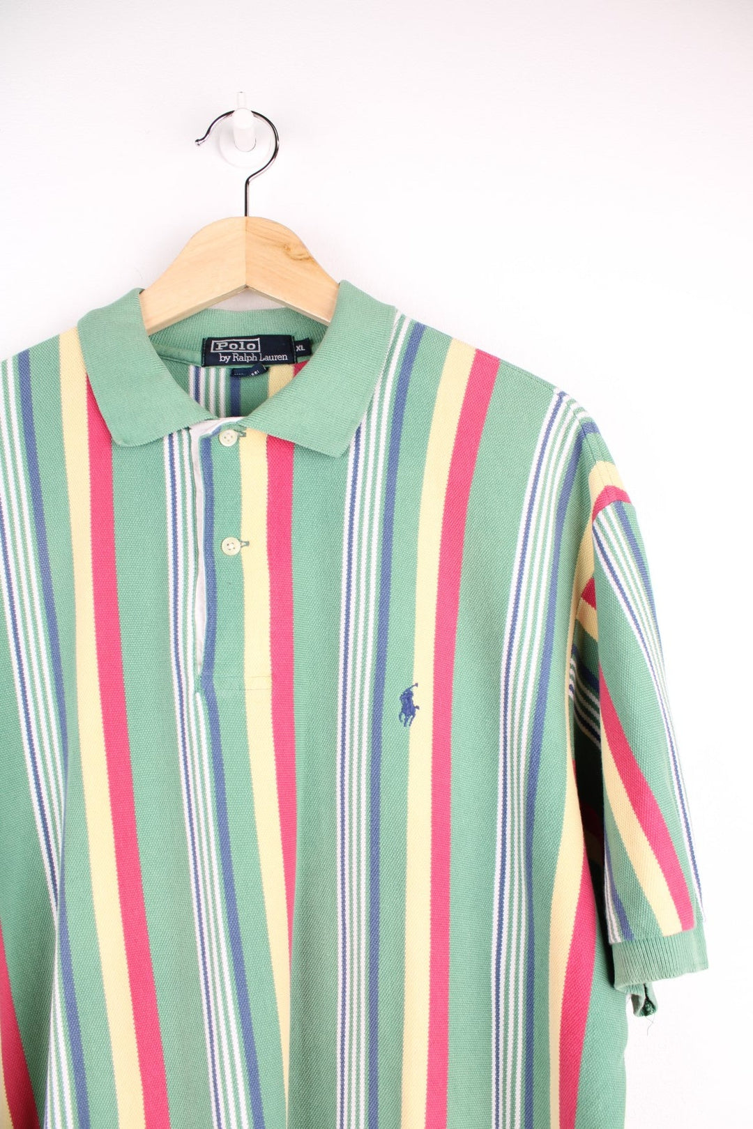 Ralph Lauren polo shirt in green, red, yellow and blue stripe with Ralph Lauren logo embroidered on the front.