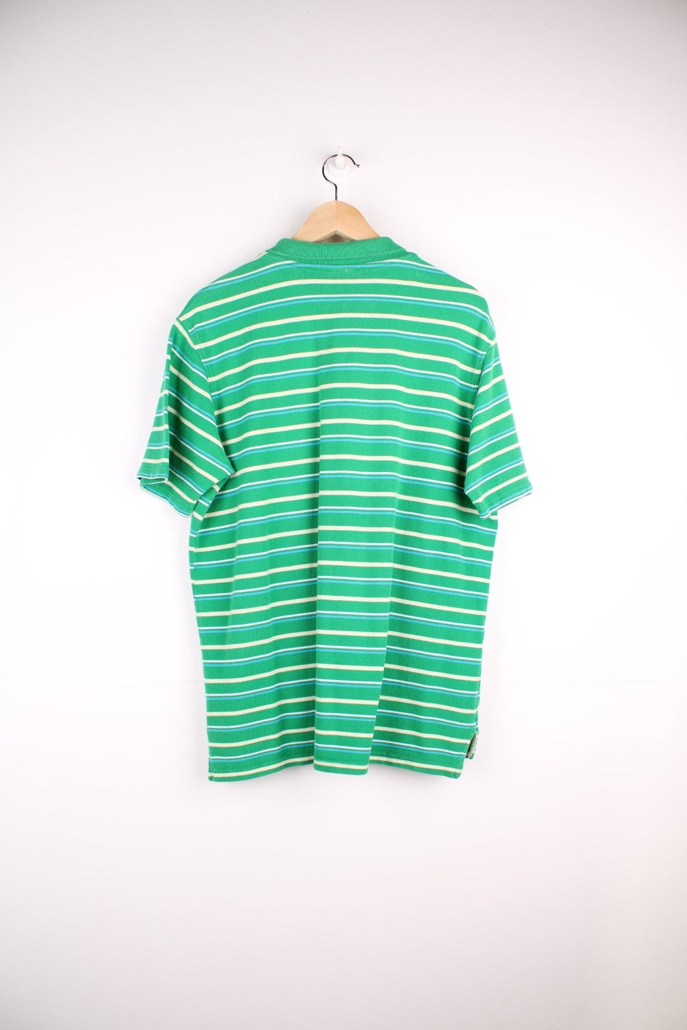 Avirex polo shirt in a striped green colourway with the logo on front.