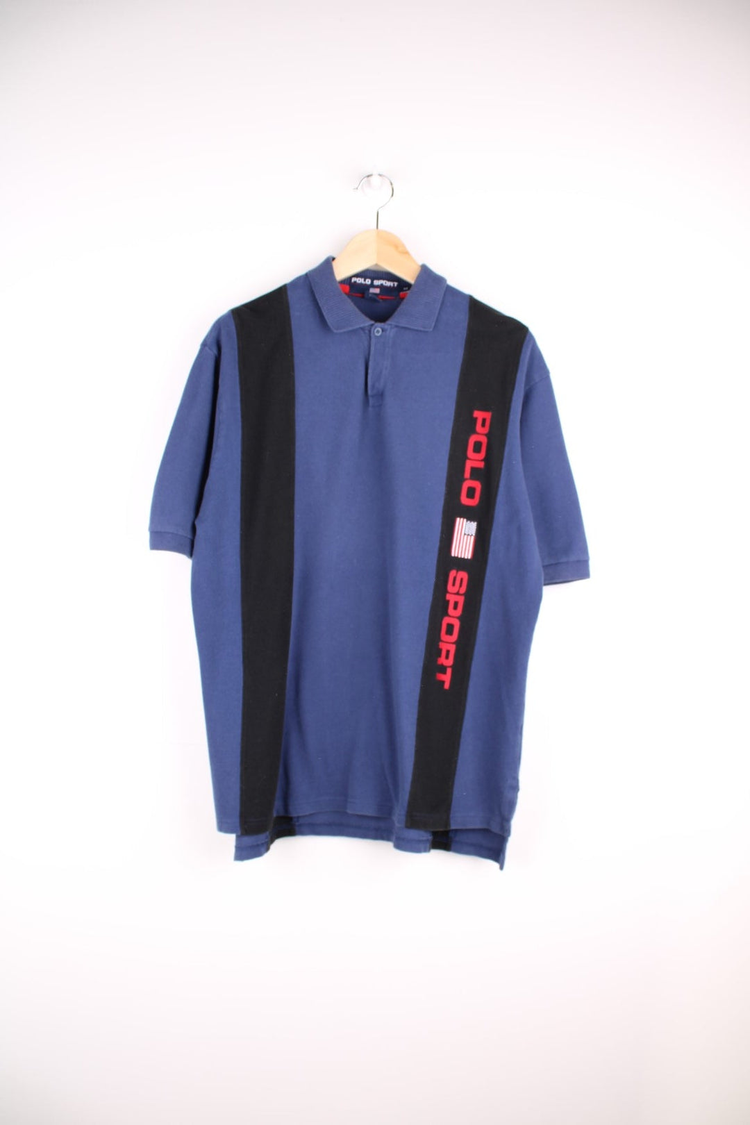 Ralph Lauren polo shirt in a blue colourway with two black stripes and Polo Sport logo on the front.