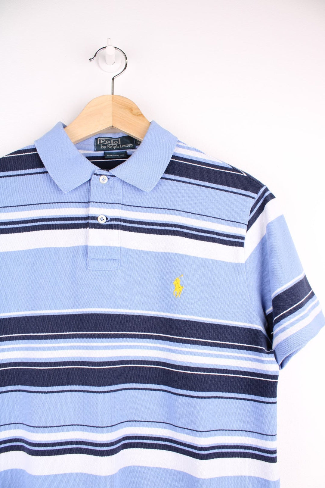 Ralph Lauren striped polo shirt in a blue colourway with the logo embroidered on front.