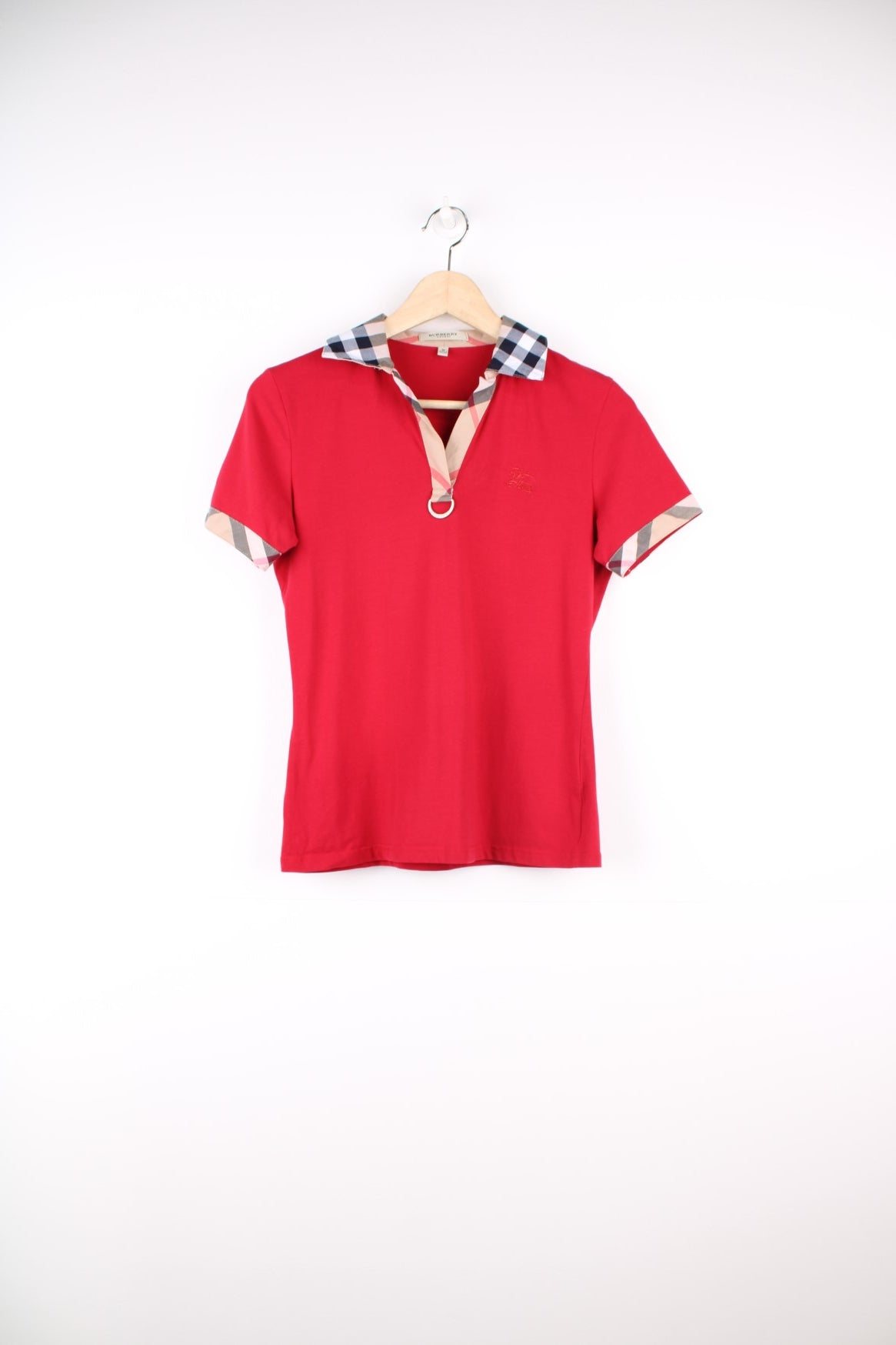 Burberry London Top in a red colourway with the nova check print on the collar and sleeves, and has the logo embroidered on the front.