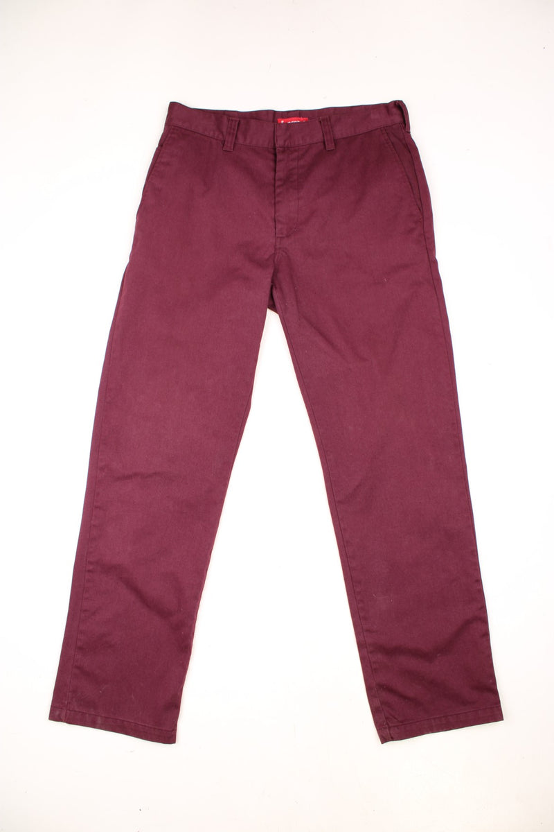 Supreme FW18 Work Pants in a burgundy colourway, plain with the logo embroidered on the back pocket.