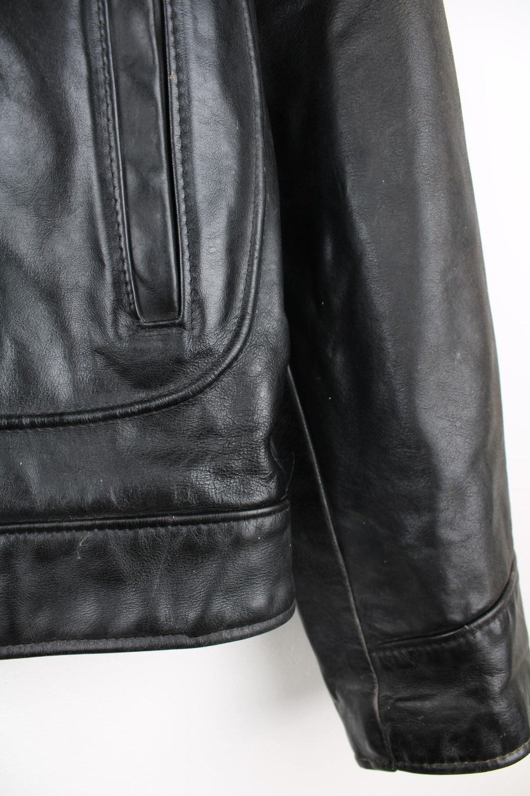 Vintage Schott N.Y.C Leather Bomber Jacket in a black colourway, zip up with multiple pockets and has a quilted lining. 