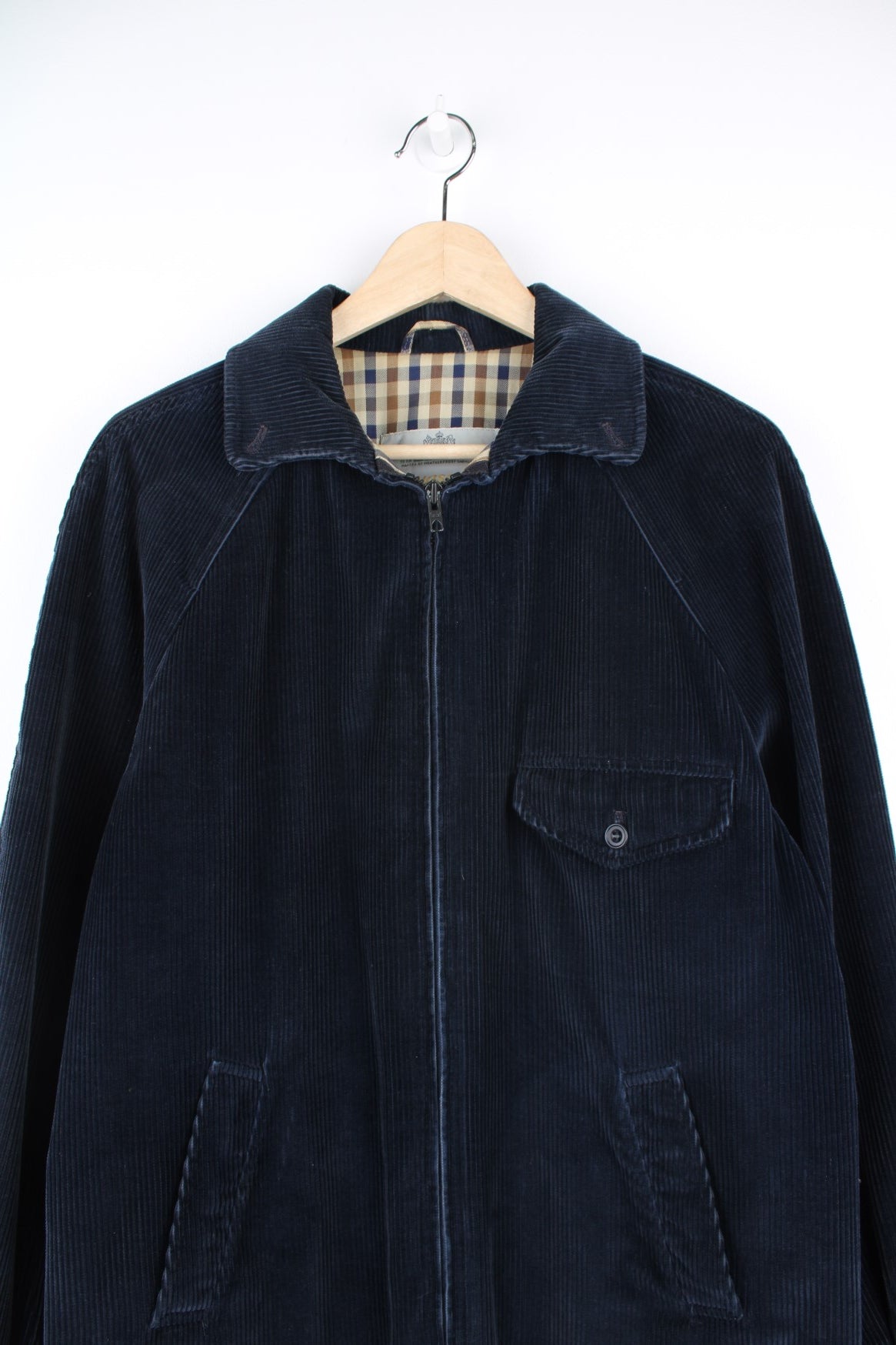 Vintage Aquascutum Corduroy Jacket in a navy colourway with the Aquascutum print lining, zip up and has multiple pockets.