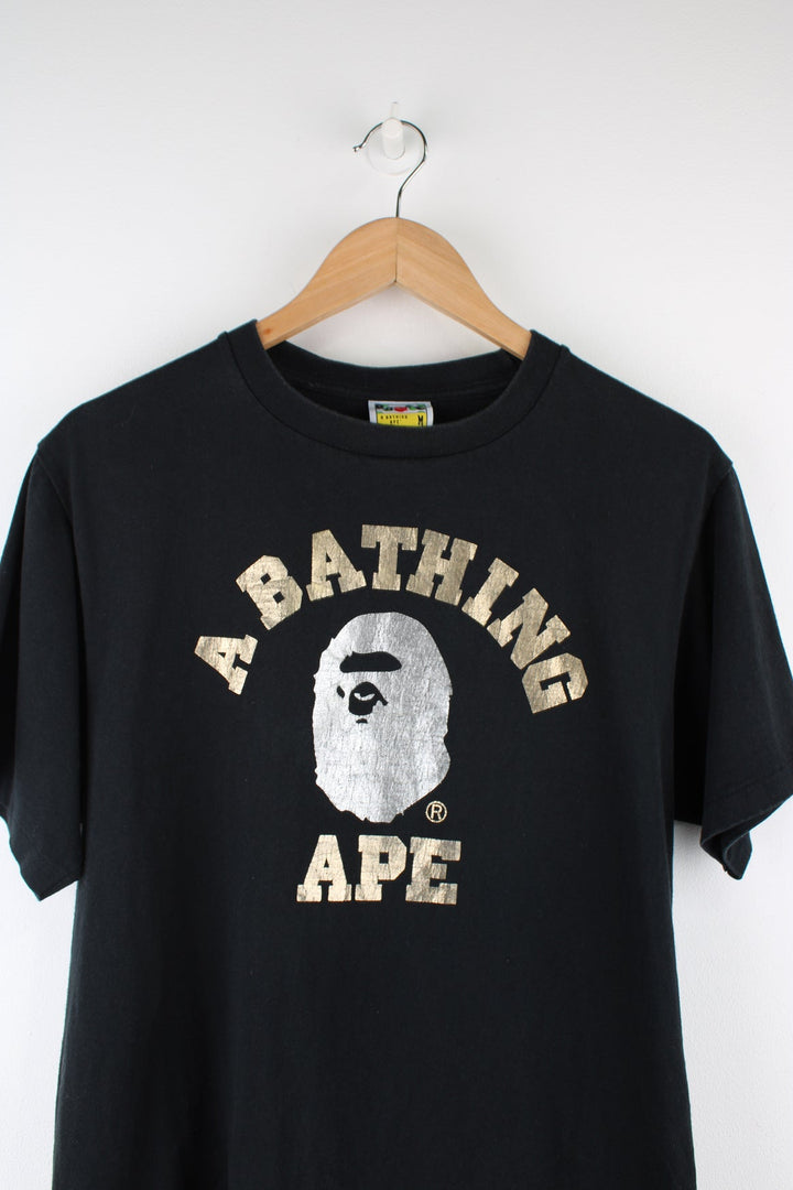 A Bathing Ape black graphic single stich t-shirt with spell-out metallic motif on the front