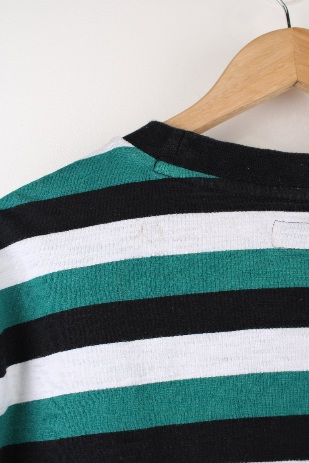 Guess green and black striped t-shirt with embroidered spell-out logo on the chest