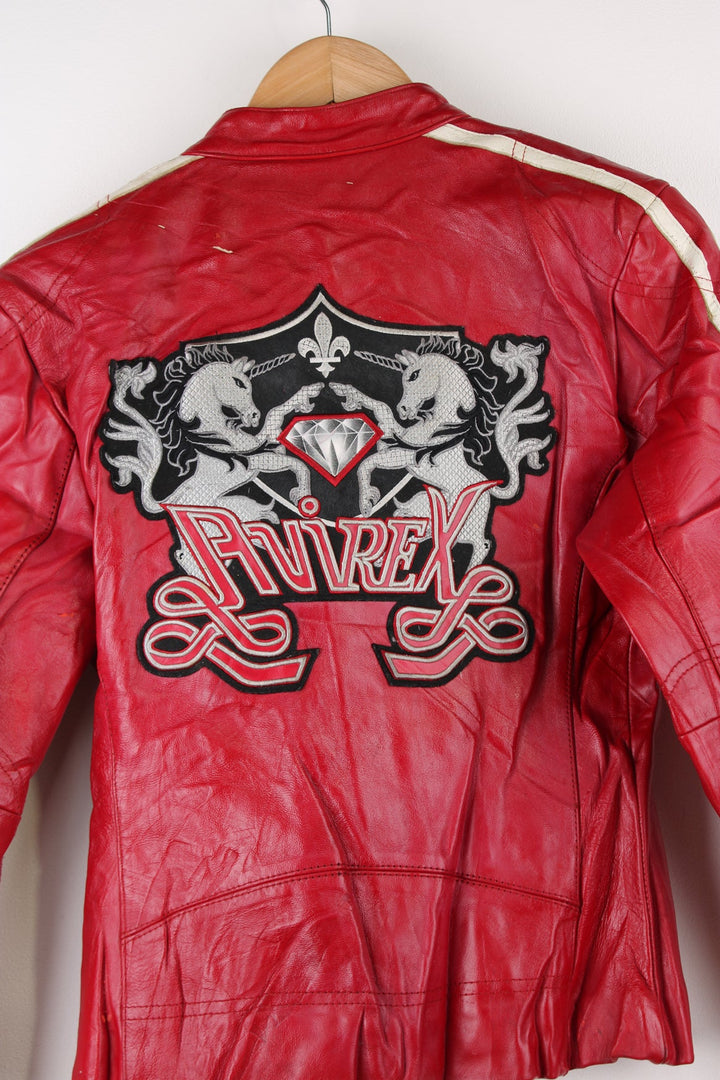 Vintage red leather Avirex zip through motorcycle jacket with white detailing and embroidered badges on the front/back.