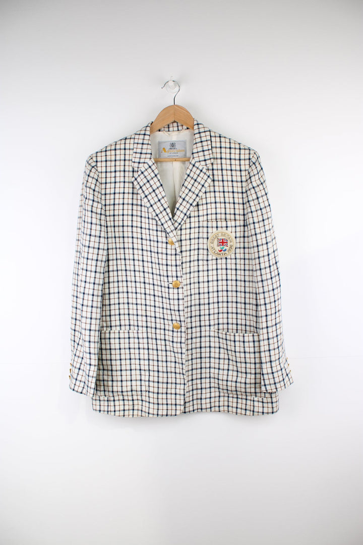 Vintage Aquascutum made in England linen blazer in a cream plaid pattern, features embellished badge on the pocket and golden buttons