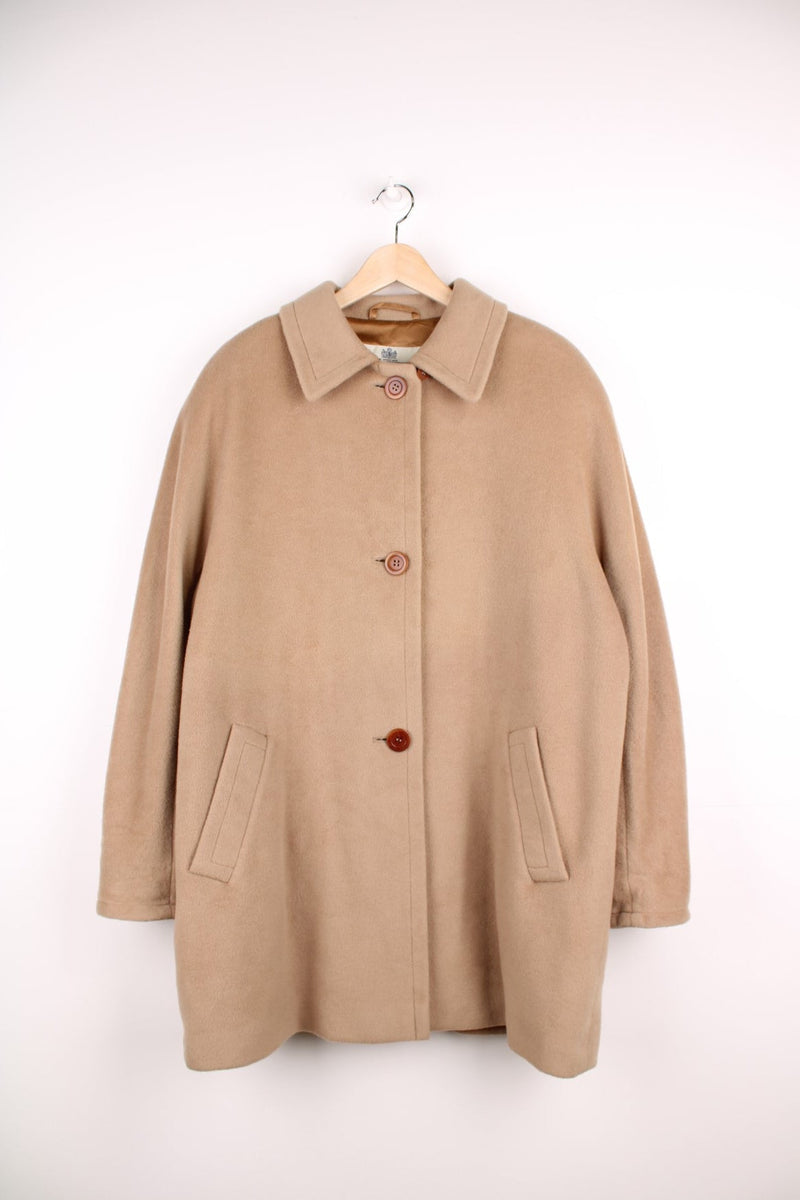 Aquascutum Cashmere Coat in a tan colourway, buttons up and has side pockets. 