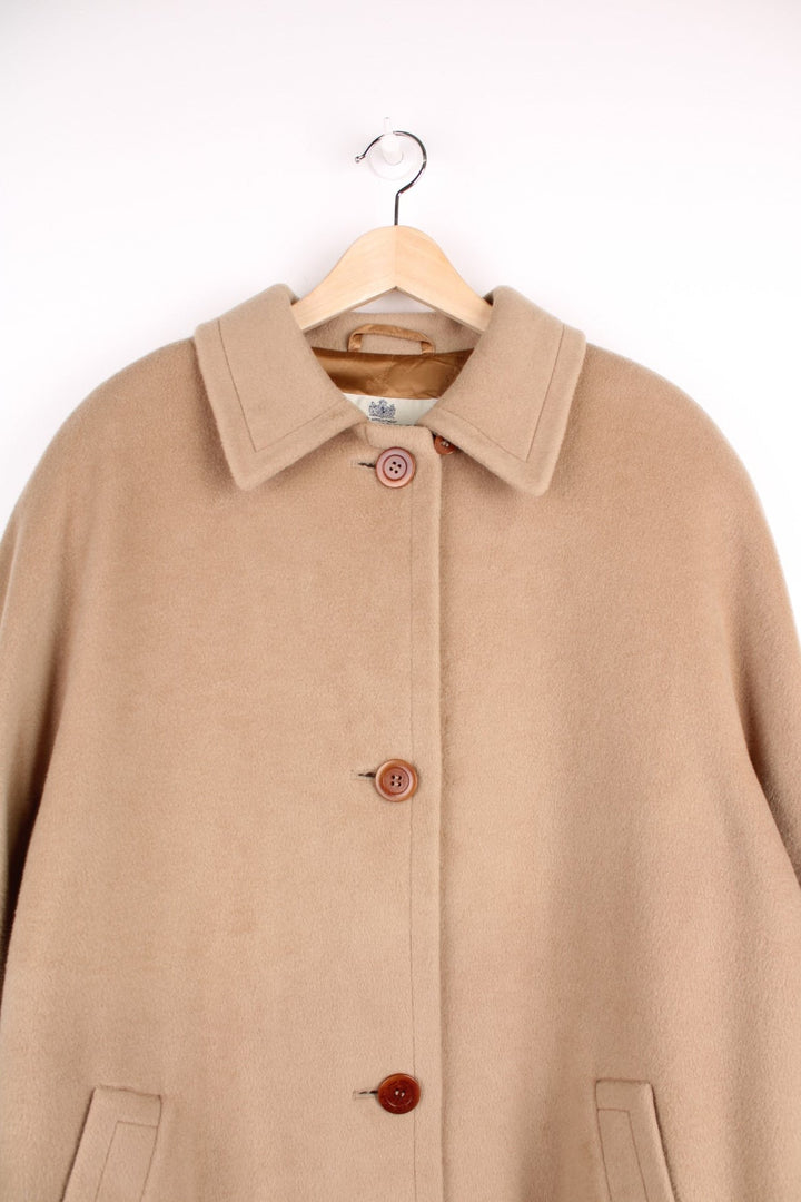  Cashmere Coat in a  colourway, buttons up and has side pockets. 