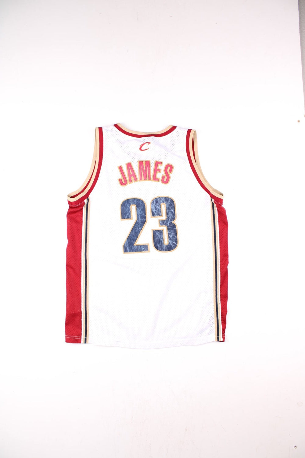 Cleveland Cavaliers Lerbon James NBA Basketball Jersey in the white, red and gold kit colourway, features embroidered logos and badge on the front, and James number 23 on the back.