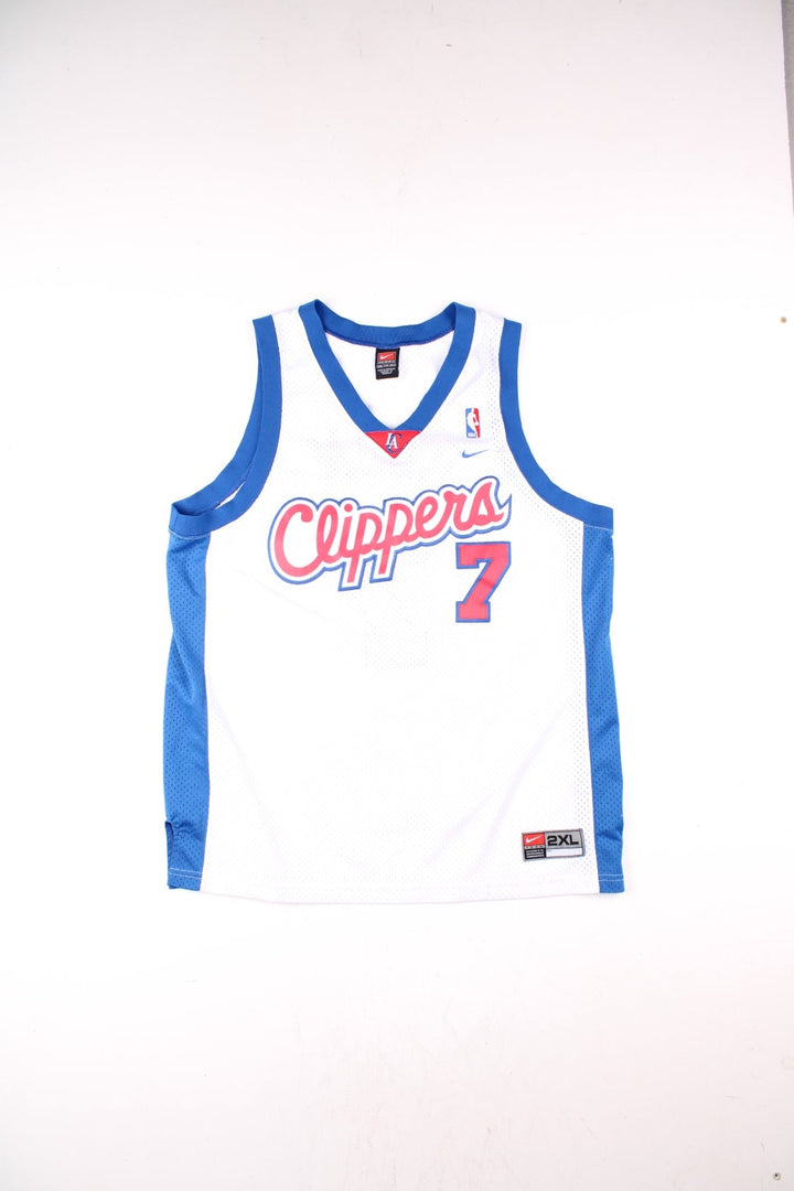 LA Clippers Lamar Odom NBA Basketball Jersey in the white, blue and red kit colourway, features embroidered logos and badge on the front, and Lamar Odom number 7 on the back.