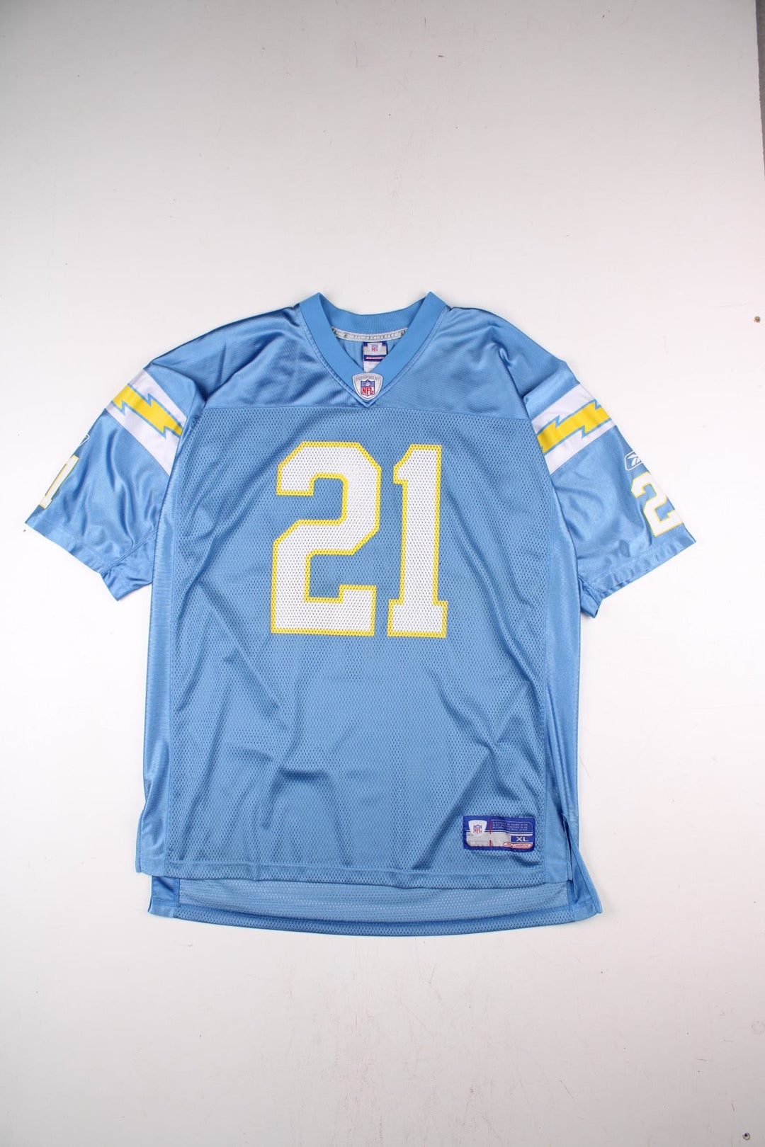 San Diego Chargers NFL LaDainian Tomlinson Jersey in the blue kit colourway, feature logos and badge on the front, and Tomlinson number 21 on the back.