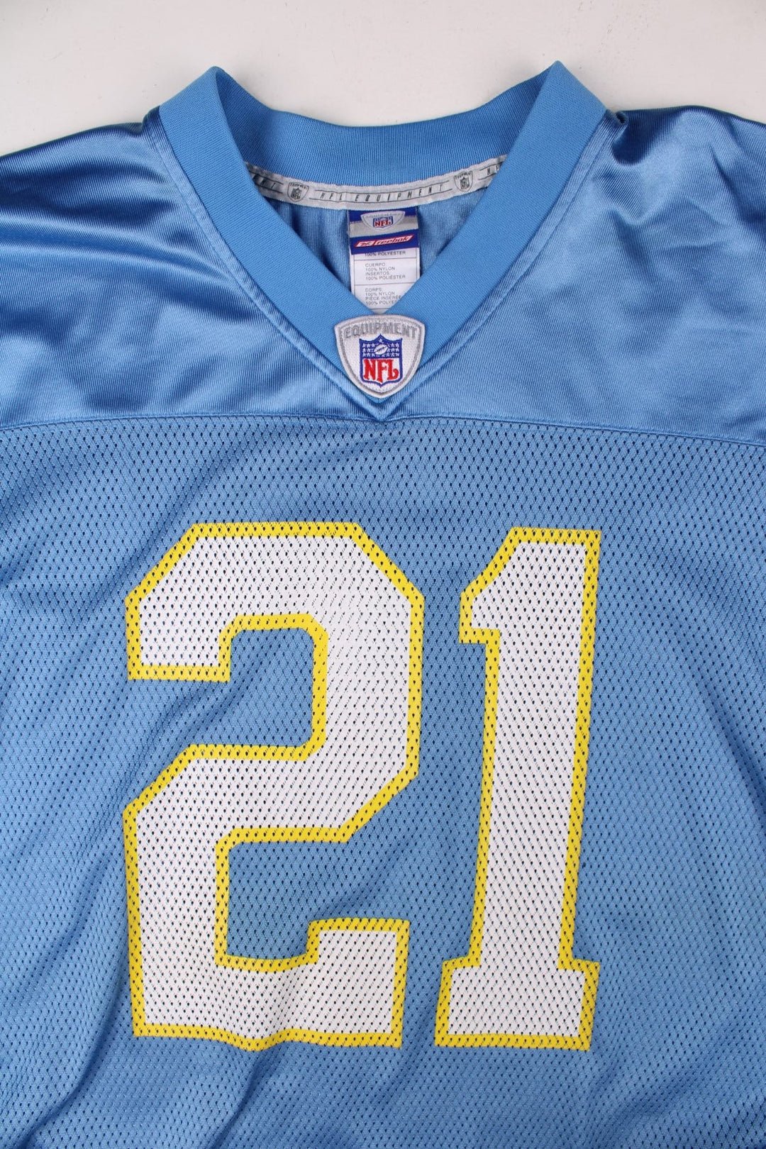 San Diego Chargers NFL LaDainian Tomlinson Jersey in the blue kit colourway, feature logos and badge on the front, and Tomlinson number 21 on the back.