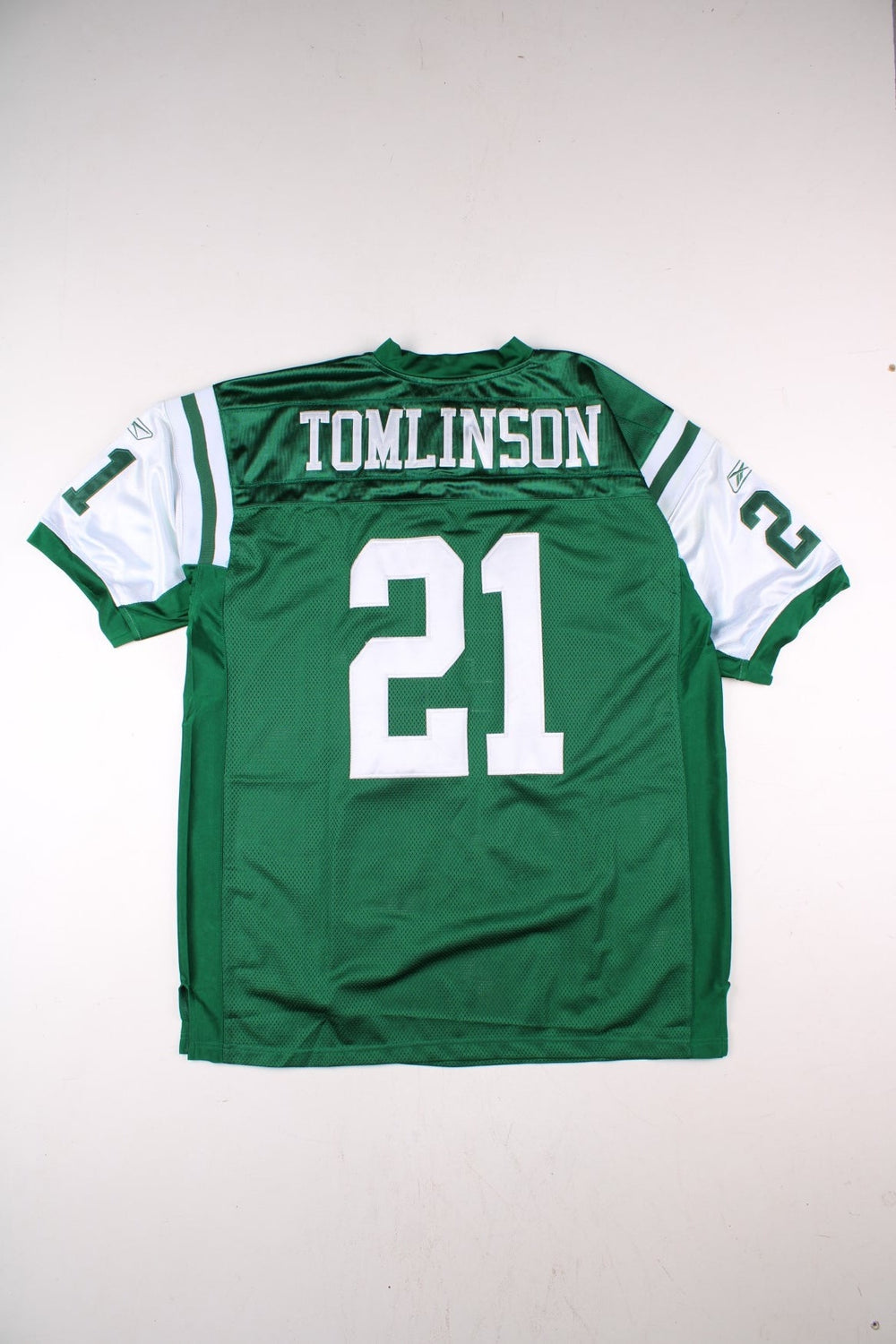 New York Jets NFL LaDainian Tomlinson Jersey in the green and white kit colourway, features embroidered logos and badge on the front, and Tomlinson 21 on the back.