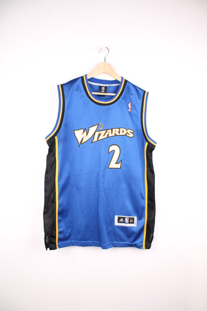 NBA Washington Wizards Adidas Jersey in a blue, black and yellow colourway, John Wall number 2 on the back, and has the logos embroidered on the front. 