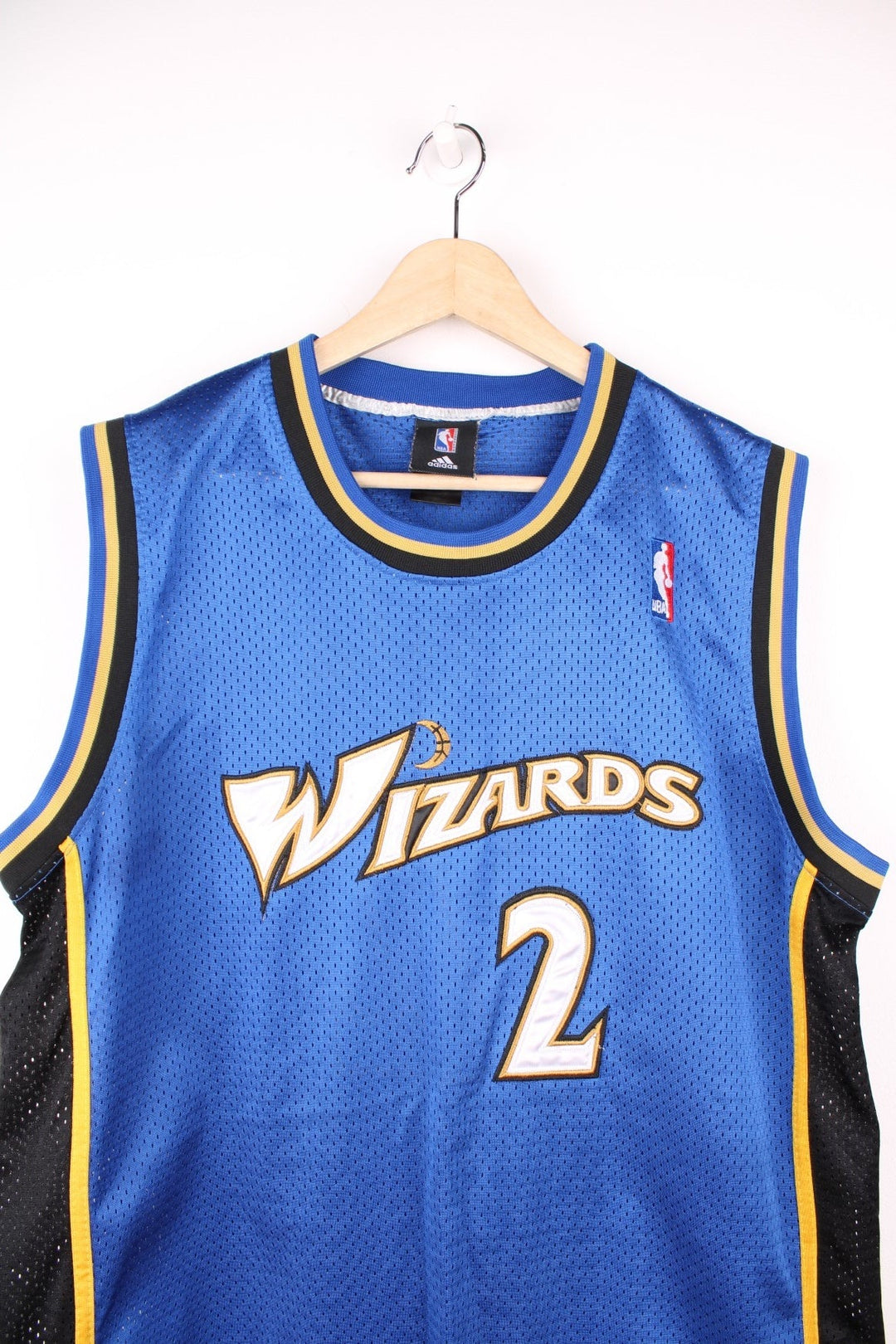 NBA Washington Wizards Adidas Jersey in a blue, black and yellow colourway, John Wall number 2 on the back, and has the logos embroidered on the front. 