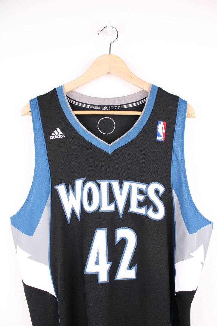 NBA Minnesota Wolves Jersey in a black, blue and white colourway, Kevin Love number 42 on the back, and has the logos embroiderd on the front. 