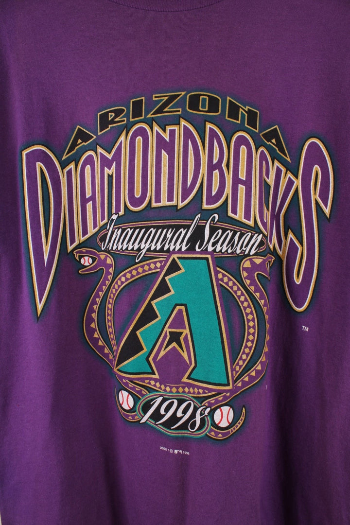 Vintage Arizona Diamondbacks baseball t-shirt in purple with a front graphic featuring snakes and baseballs.