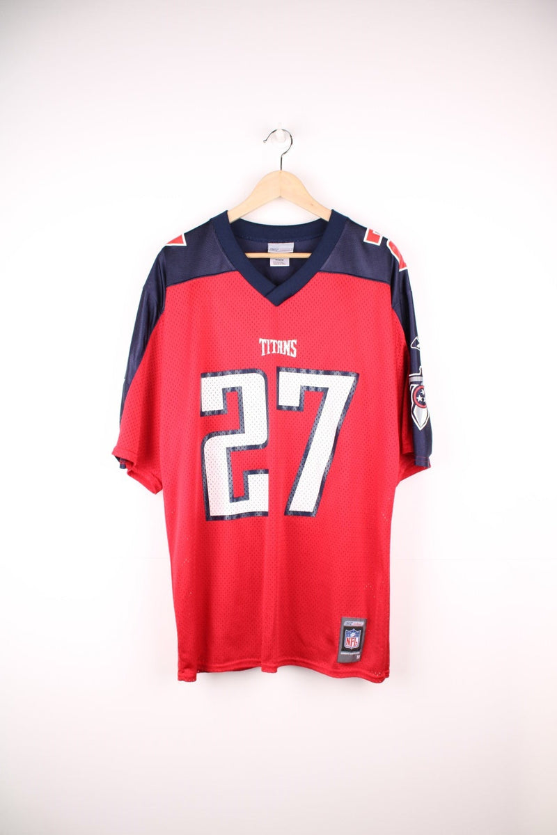 NFL Tennessee Titans Reebok Jersey in a red, blue and white colourway, Eddie George number 27 printed on the back, and on the front the logos. 