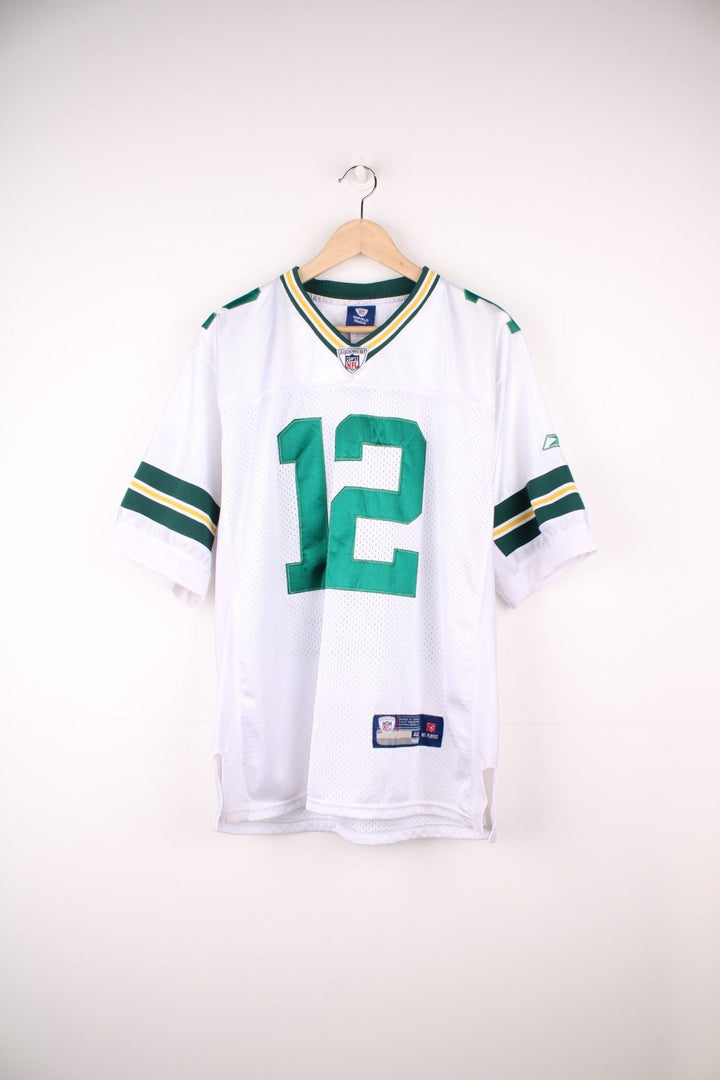 NFL Green Bay Packers Jersey in a white green and yellow colourway, Aaron Rodgers number 12 on the back, and the logos embroidered on the front. 