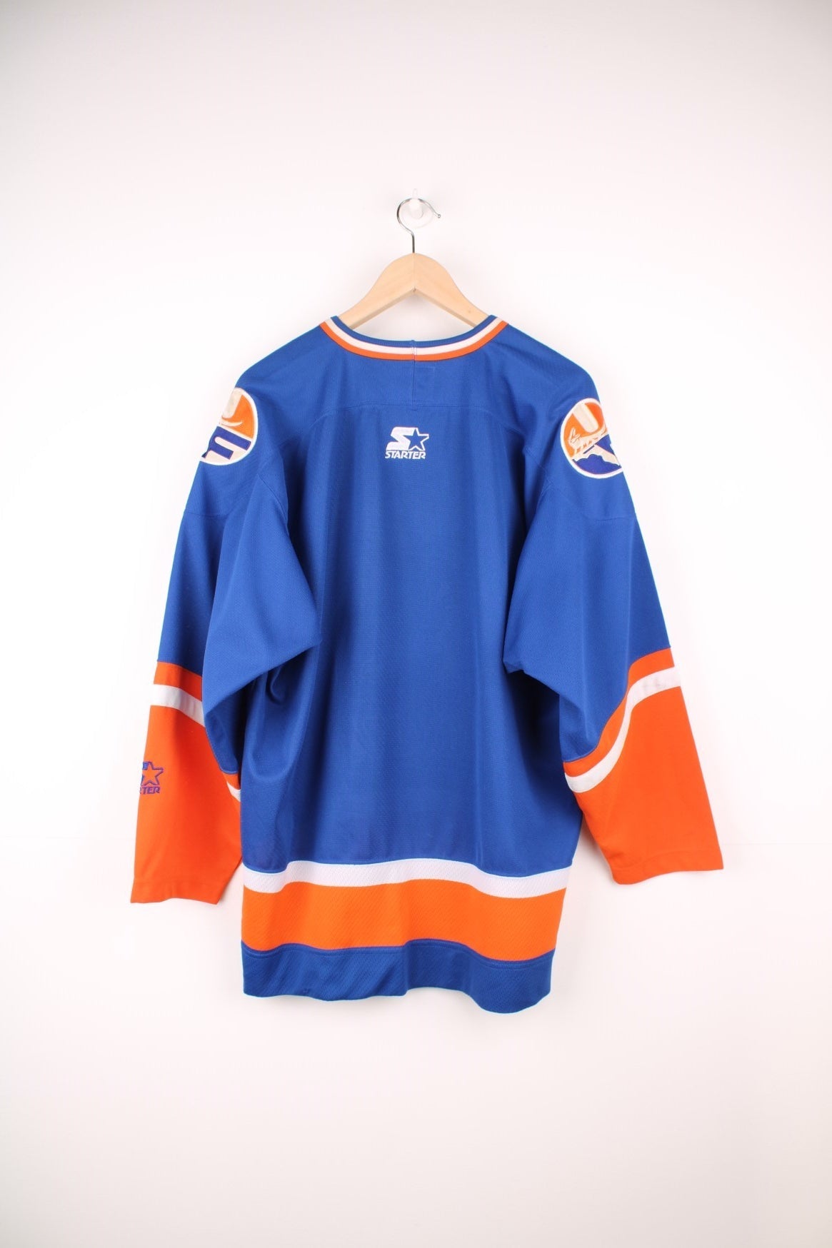 University Of Florida Gators Hockey Jersey in a blue, white and orange colourway, and has the logos embroidered on the front and back. 