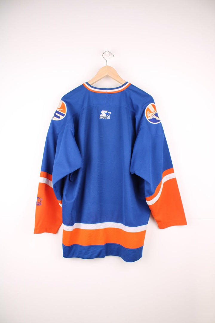 University Of Florida Gators Hockey Jersey in a blue, white and orange colourway, and has the logos embroidered on the front and back. 