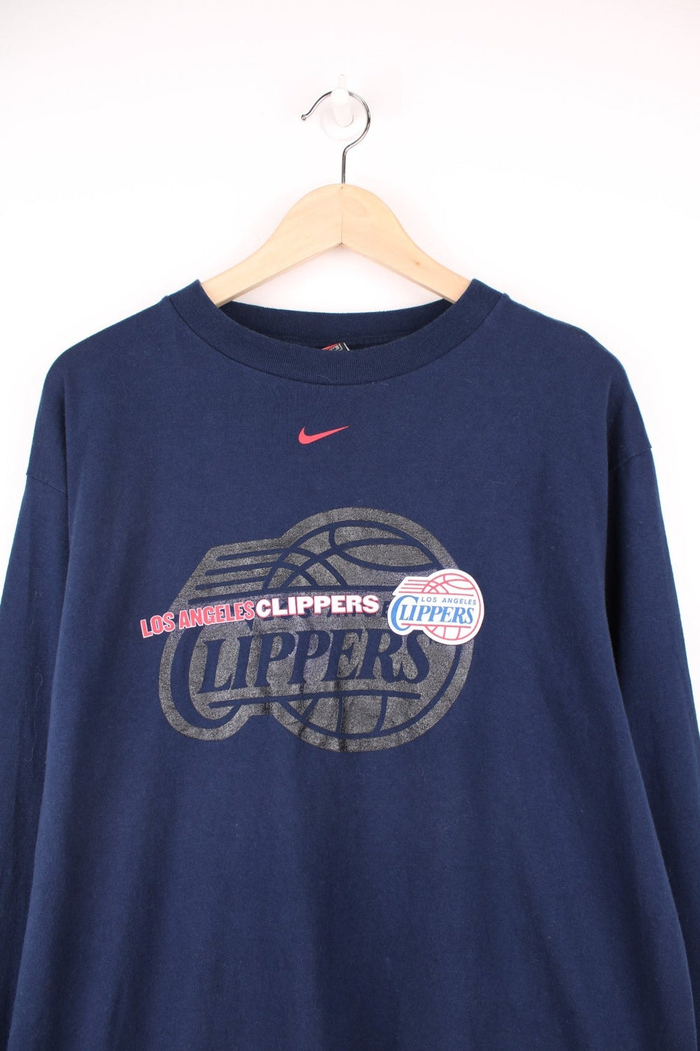 Los Angeles Clippers Nike NBA Long Sleeved T-Shirt in a blue colourway with the spell out and logos printed on the front and down the right sleeve.