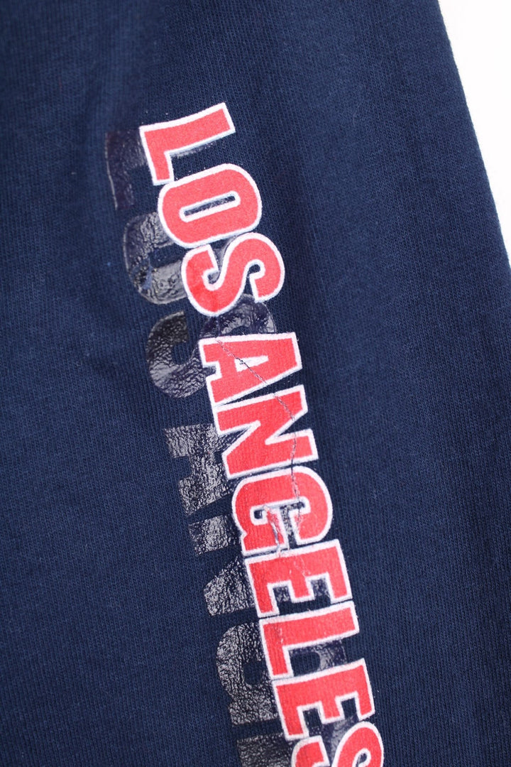 Los Angeles Clippers Nike NBA Long Sleeved T-Shirt in a blue colourway with the spell out and logos printed on the front and down the right sleeve.